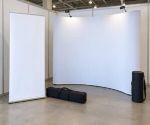 retractable banner stand vs pop up display